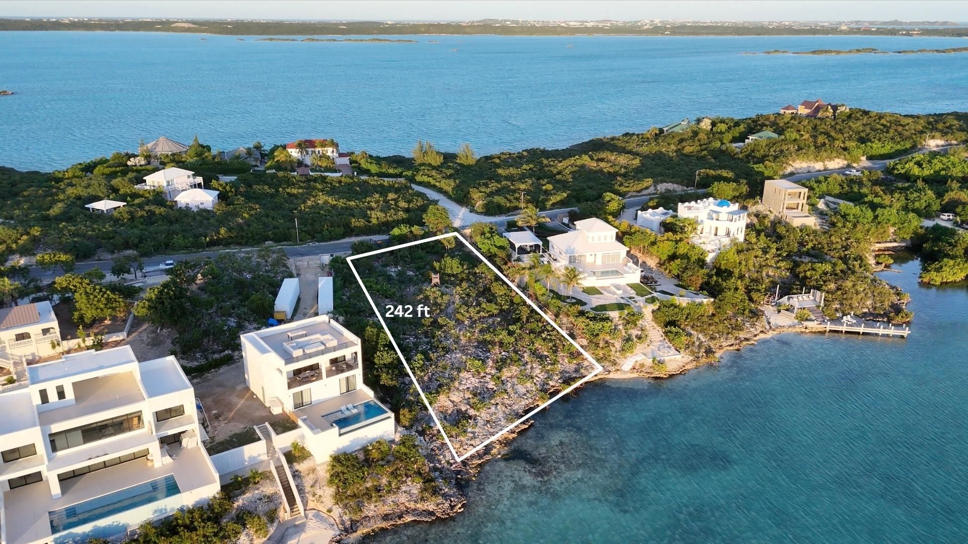 The parcel from the air with its boundary marked, 242 feet along one side